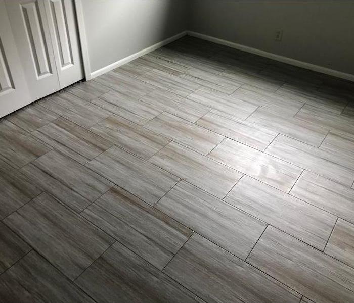  Room with laminate flooring and gray walls 