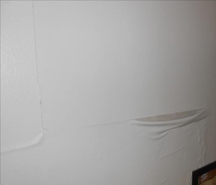 White Ceiling with water causing the paint to come off