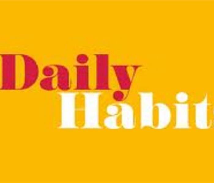The words Daily in red and Habit in white with a yellow background
